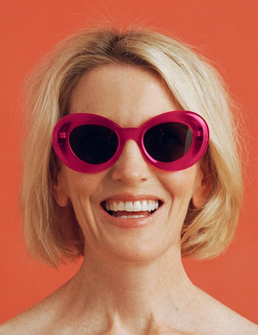 woman with sunglasses smiling